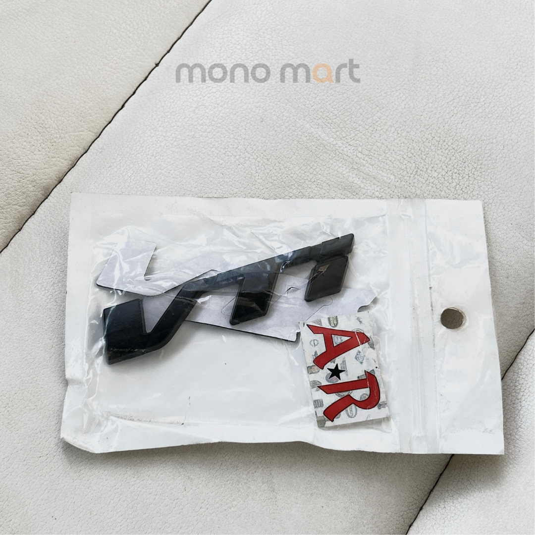 VTI Metal black badge